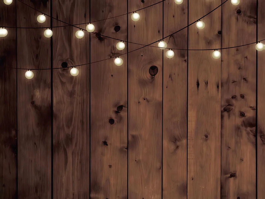 Fairy lights on timber photobooth backdrop